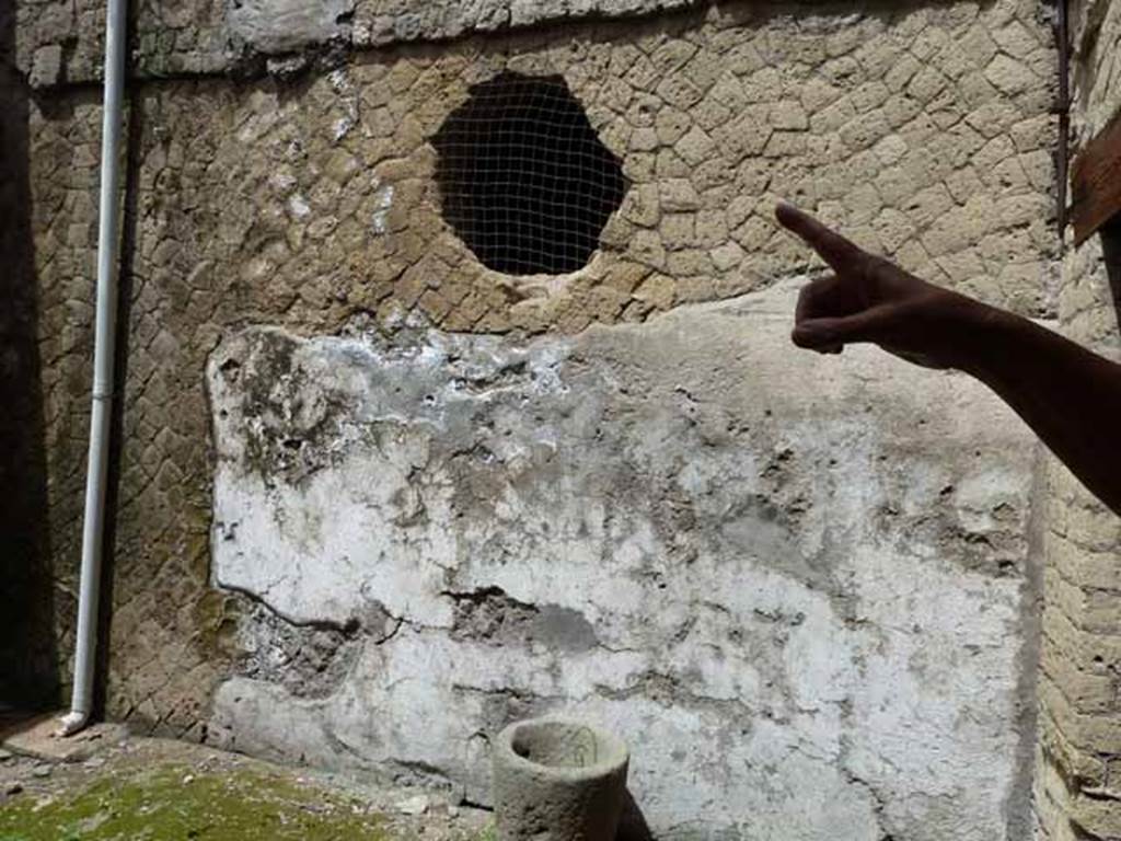 Ins. V, 19. May 2010. Lower west wall of rear room.